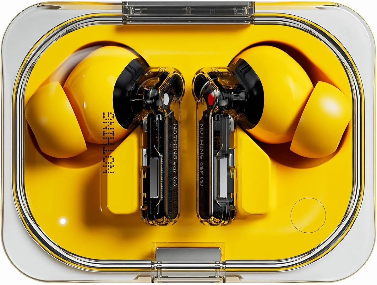 Yellow Nothing Ear (a) wireless earbuds inside their transparent charging case