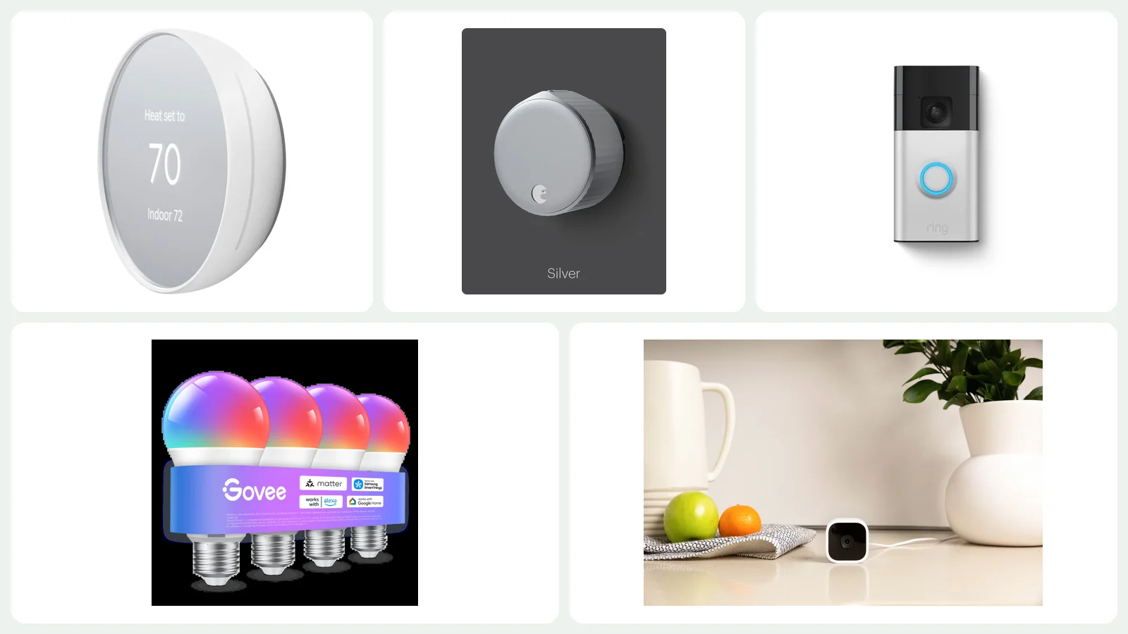 Google Nest Thermostat, August Wi-Fi Smart Lock, Ring Battery Doorbell, Govee smart bulbs and Blink Mini arranged on a light background